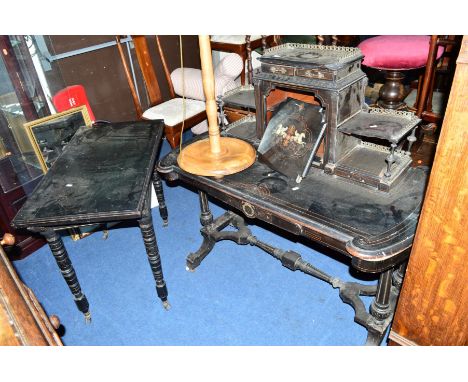 A DISTRESSED EDWARDIAN LACQUERED SHERITON STYLE SIDE TABLE, the upper section with a fall front door and two tier shelves to 