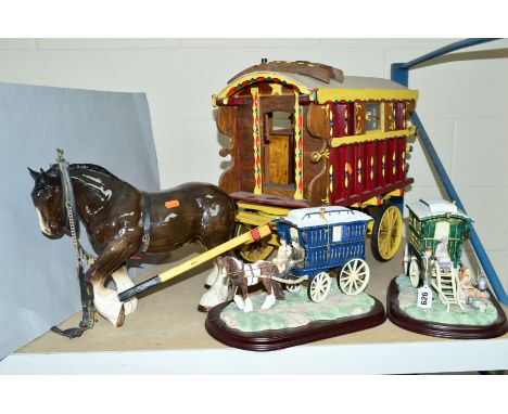 A WOODEN MODEL OF A HORSE DRAWN GYPSY CARAVAN, with Melba Ware horse, together with two Leonardo Collection gypsy caravan fig