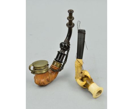 TWO PIPES, to include aa Meerschaum pipe of claw design, length 110mm, together with a B.B.K. Carved wood and horn pipe, leng