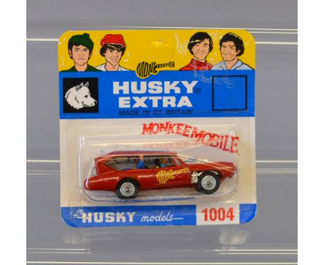 Husky 1004 The Monkees Monkeemobile in red with white roof, 'Monkees' decal to side. Model is E, sealed on VG card, unpunched