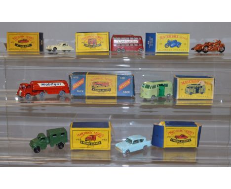 Six boxed Matchbox diecast models from the '1-75' range, 7b Ford Anglia, 32a Jaguar, 34b VW Caravanette, missing a door, 56a,