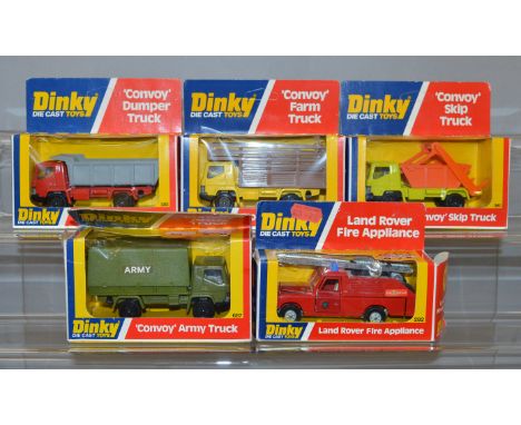 Five Dinky Toys in window boxes including four different model trucks from the 'Convoy' series   and 282 Land Rover Fire Appl