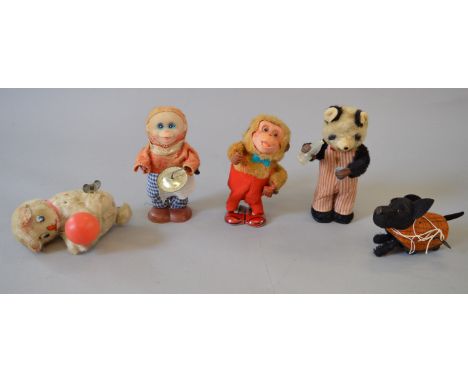 Five unboxed vintage clockwork animals four with fixed keys including two monkeys, a drinking Panda and a cat playing with a 