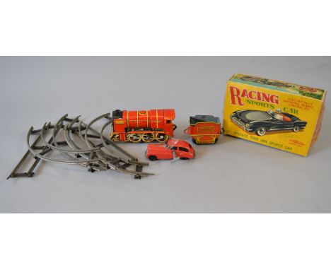 Tinplate and plastic toys: Clifford Series Racing Sports Car, red plastic model with remote control; Brimtoy Pocketoy red clo
