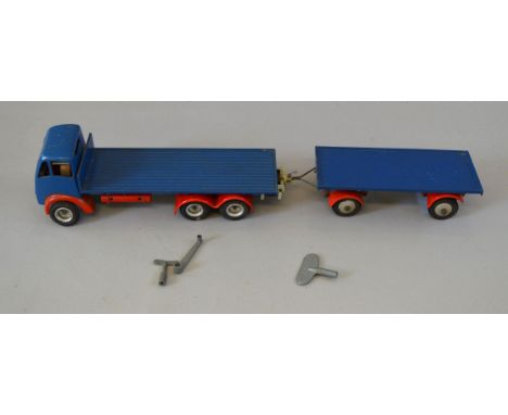 An unboxed Shackleton Foden FG 6-wheeled Flatbed Lorry with matching 'Dyson' Trailer, the former with clockwork operation, ha