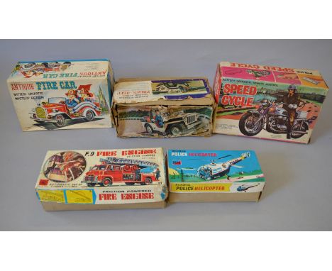 Five tinplate and plastic toys, all emergency vehicles: Daiya (Japan) Battery Operated Mystery Action Police Jeep; Police Spe