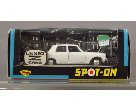 A boxed Tri-ang Spot On diecast model, 309 'Z Cars' Ford Zodiac with cast hubs in white  'KTJ578', VG in F/G window box with 