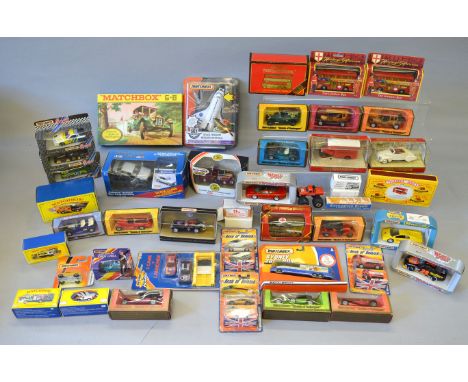 A mixed lot of boxed and carded diecast models by Matchbox including  several different models from the 'Models of Yesteryear