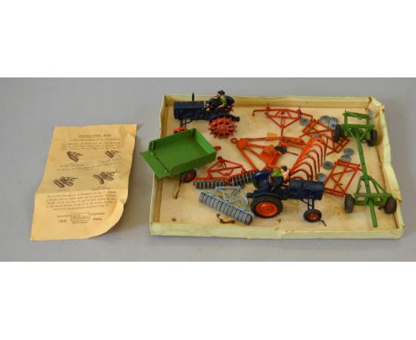 A Britains 146F Model Farm Gift Set with box base only, missing the lid. comprising two Fordson Major Tractors, both dark blu