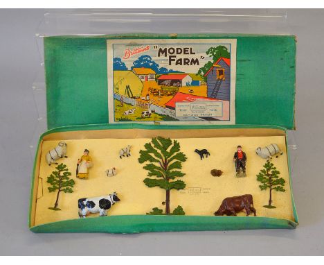 Britains Model Farm No. 56F, comprising of: farmer; farmer's wife; three trees; eight animals. Figures tied to original backi