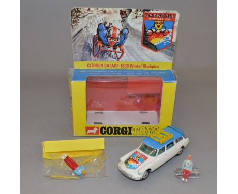 Corgi 499 Citroen Safari Grenoble 1968 Winter Olympics, model is white with blue roof, yellow roof rack, green interior, and 