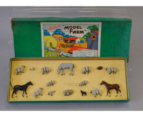 Britains Model Farm No. 121F set, comprising of 16 animals (horses, sheep and chickens). VG, tied in to card insert (grubby) 