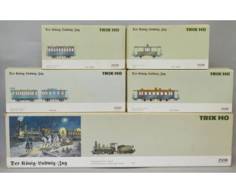 HO Gauge. A boxed Trix 21230  "Tristan" Locomotive and Tender in display case with plastic sliding window, models appear F wi