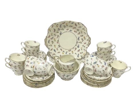 Royal Worcester Lady Margaret part tea service, comprising Two cake plates, eleven teacups, twelve saucers, twelve dessert pl