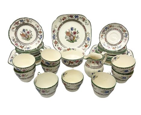 Copeland Spode part tea service decorated in the Chinese Rose pattern, consisting nine cups and eleven saucers, milk jug, ope