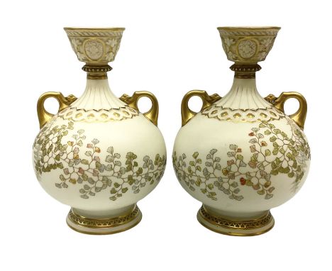 Pair of Royal Worcester ivory twin handled vases of baluster form, design number 1109, with printed mark beneath, H23cm