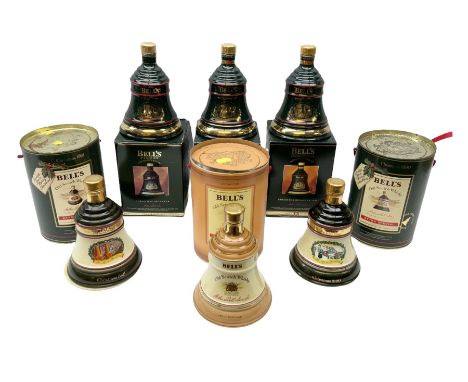 Six Bell's Old Scotch Whisky ceramic decanters comprising Old Scotch Whisky decanter, Christmas decanters 1990, 1991, 1993, 1