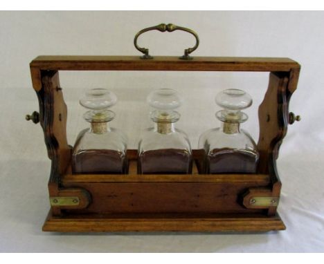 Three decanter tantalus
