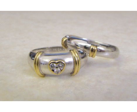 Boodles 18ct white gold bridal set consisting of matching wedding and engagement rings size M total weight 9 g