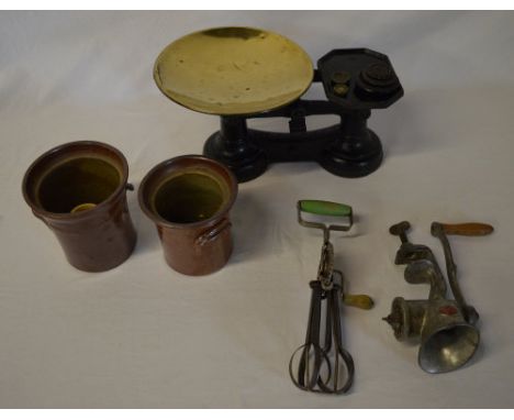 Scales with weights, hand whisk, meat grinder and two pots
