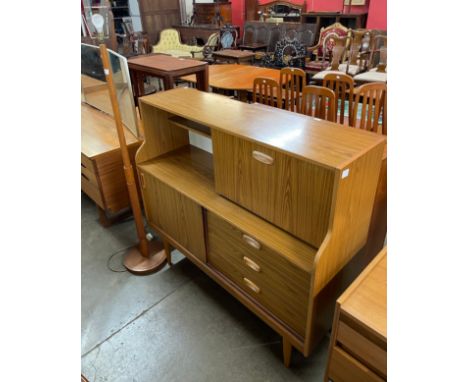 A teak effect highboard and a beech standard lamp 