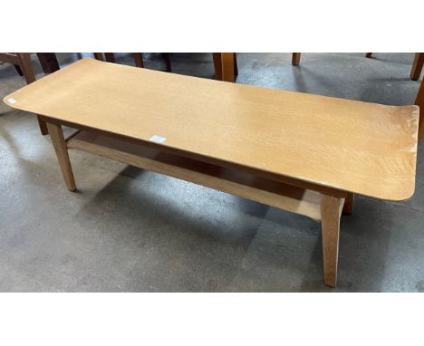 A light oak Myer sleigh top coffee table 