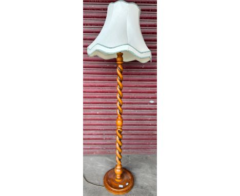 A beech barleytwist standard lamp 