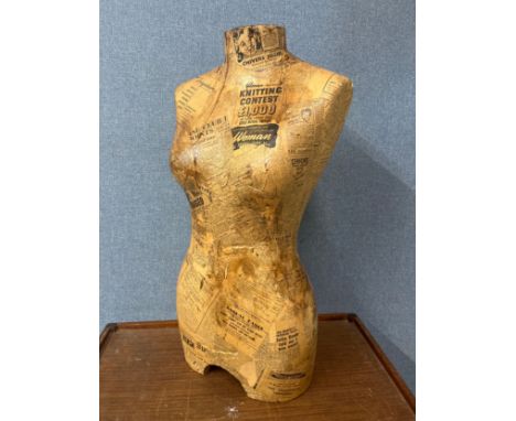 A decoupage half mannequin 