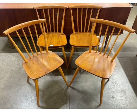 A set of four Ercol Blonde elm and beech 737 model chairs 