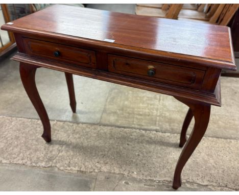 A Victorian style hardwood two drawer console table 