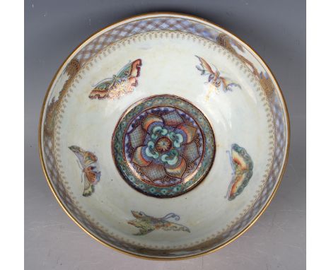 A Wedgwood lustre circular bowl, circa 1920, designed by Daisy Makeig-Jones, decorated to the interior with butterflies aroun