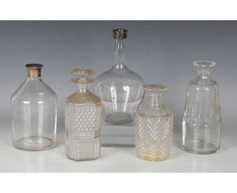 A silver mounted clear glass decanter, Birmingham 1876, the Prussian shaped body with frosted base, detailed 'BARTON &amp; CO