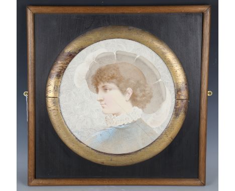 A pair of Victorian art pottery roundels, late 19th century, signed 'L. Dalpayrat, London', each painted with a head and shou
