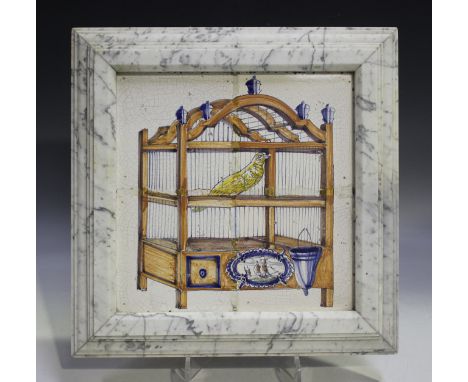 A Delft four-tile panel, late 18th century, polychrome painted with a yellow bird in an elaborate cage, approx 27cm square, h