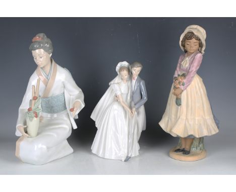 Two Lladro figures, comprising Oriental Girl, No. 4840, and Sayonara, No. 4989, together with four Nao figures, including a k