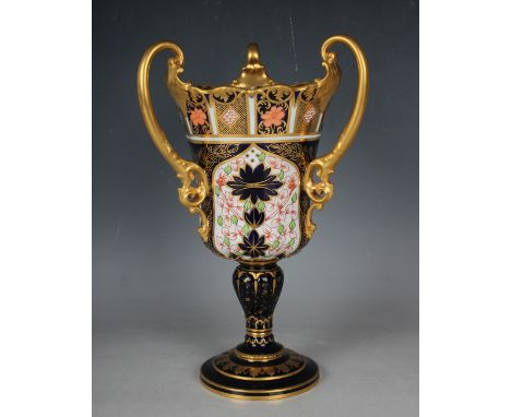 A Royal Crown Derby Imari three-handled footed vase, circa 1908, shape No. 1258, pattern No. 1128, the baluster cup-shaped bo