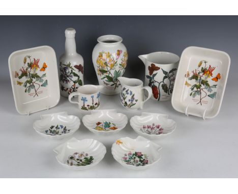 A large group of Portmeirion Botanic Garden pottery tableware, including plates in five sizes, cups and saucers, jugs, condim