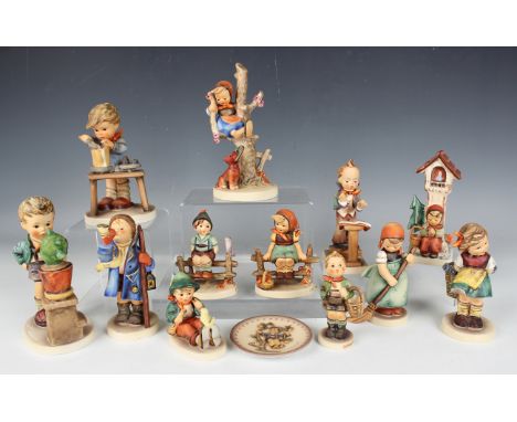 Twelve Goebel Hummel pottery figures, including Hear Ye, Hear Ye, Band Leader and A Fair Measure, together with a similar min
