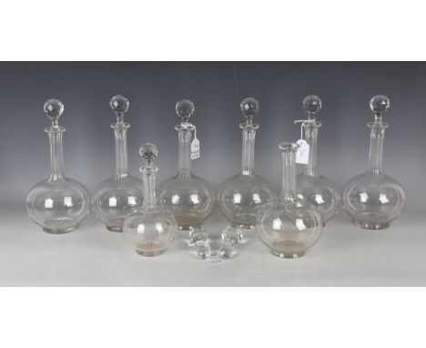A part suite of cut table glass, circa 1900, the plain ovoid body above slender hexagonal notched stems and star cut feet, co