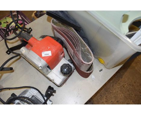 Makita belt sander together with sanding belts