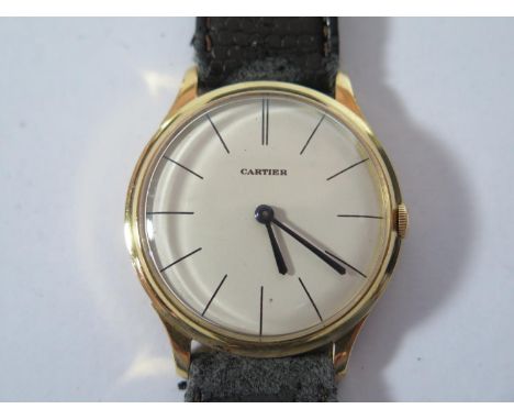 A Jaeger LeCoultre 18ct Gold Gent's Wristwatch with Cartier 34mm dial, movement no. 1203369, 1960's, running 