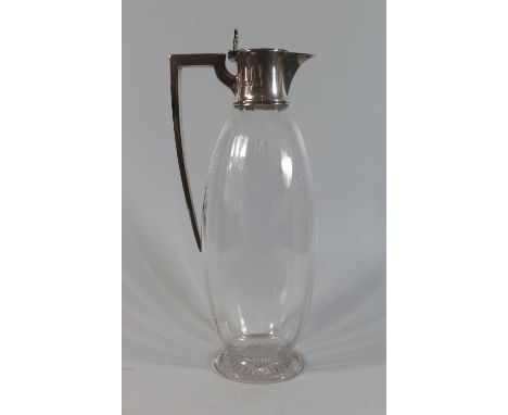 A Victorian Silver Mounted Claret Jug, London 1895, W. Hutton & Sons, 24.5cm high 