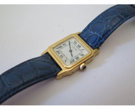 A Cartier Santos Ladies 18ct Gold Wristwatch, the 17mm dial with Roman numerals and manual movement, case no. 380971302, runn