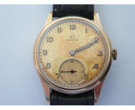 An Omega 9ct Gold Dennison Cased Gent's Manual Wristwatch, the 34mm dial with subsidiary seconds dial, cal. 260 movement no. 
