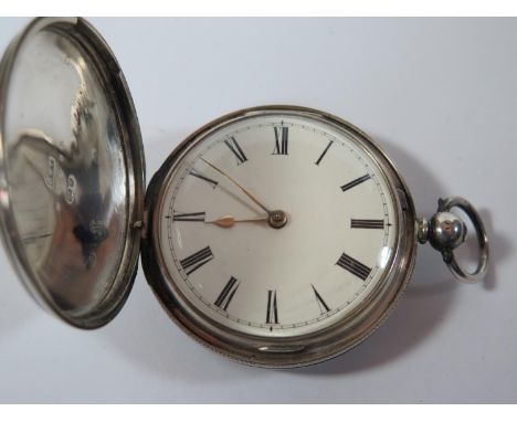 A Victorian Silver Cased Keywound Chain Driven Fusee Full Hunter Pocket Watch, the outer case with engine turned decoration, 