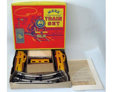Tin Plate Toy _ A Marx 765 Clockwork Streamliner Train Set. Manufactured in 1948 and complete with box, instructions and key 