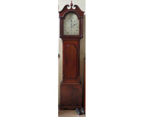 Walter Tucker, Exeter _ An Early 19th Century Eight Day Mahogany Longcase Clock, the arched silvered dial engraved with figur