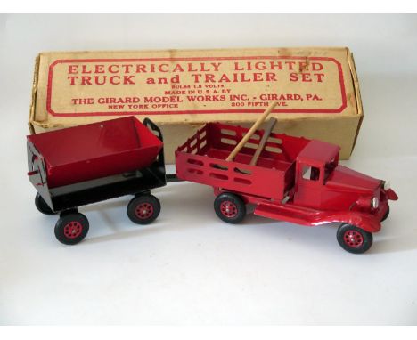 Tin Plate Toy _ The Girard Model Works Inc. Tin Plate Electrically Lighted Truck and Trailer Set complete with miniature sled