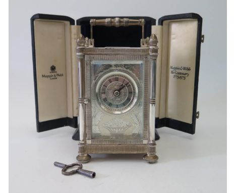 A Mappin & Webb Bi-Centenary 1775-1975 Silver Cased Striking Carriage Clock, the chased foliate decorated backplate numbered 