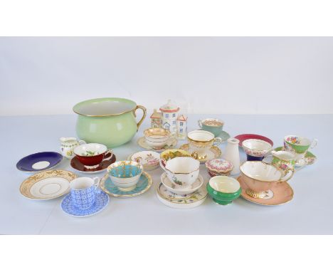 A collection of  bone china and porcelain cups and saucers,  including Aynsley, Royal Grafton, together with a Royal Worceste